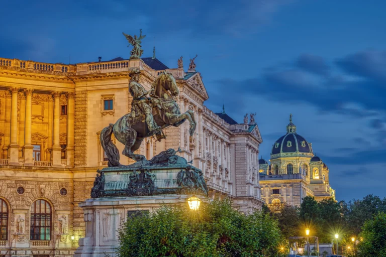 Prinz Eugen statue with Hofburg palace and Kunsthistorisches Museum in Vienna at night