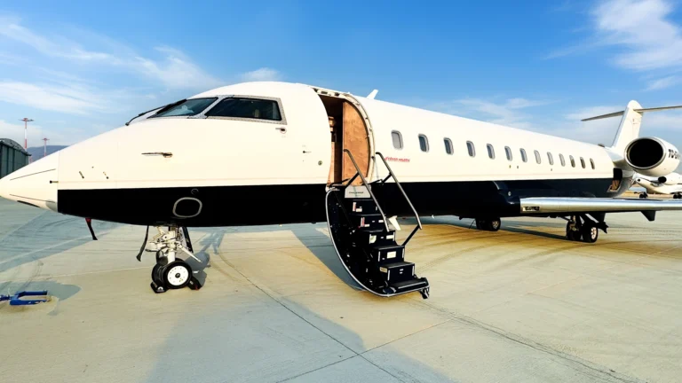 Private jet interior with passengers seated and relaxed